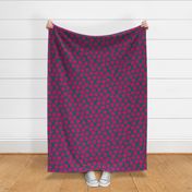 tossed raspberries on dark green | large