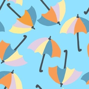 Orange & Blue Umbrellas on Turquoise Background