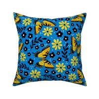 Large Scale Golden Yellow Tiger Swallowtail Butterflies on Blue