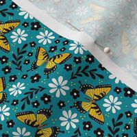 Small Scale Golden Yellow Tiger Swallowtail Butterflies on Turquoise