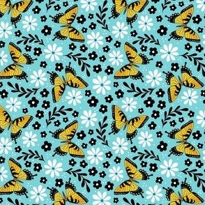 Small Scale Golden Yellow Tiger Swallowtail Butterflies on Pool Blue