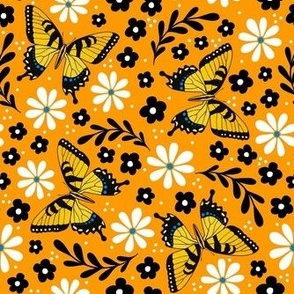 Medium Scale Golden Yellow Tiger Swallowtail Butterflies on Marigold