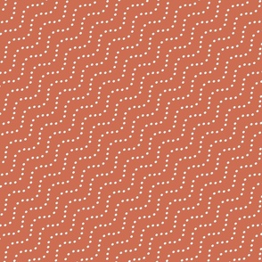 Normal scale • Wavy dots brick/ orange