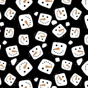 Floating snowmen smiley marshmallows  on black