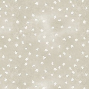 Garden of tiny warm white stars on taupe texture (1/4 inch stars)