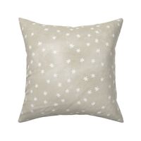 Garden of tiny warm white stars on taupe texture (2/3 inch stars)