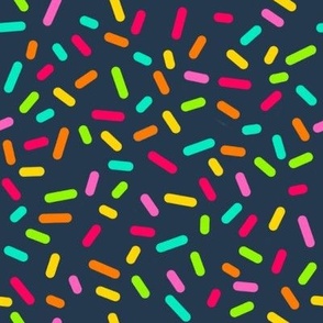 Bigger Scale Candy Rainbow Confetti Sprinkles on Navy