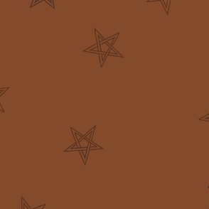 line drawn magic shooting stars  on chocolate brown Halloween or Christmas