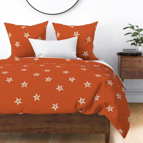 Scattered magical celestial stars rust orange