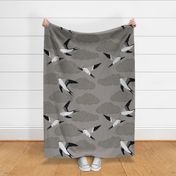 flying swallows / bird in a sky with clouds - grey - large scale