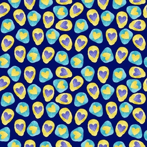 Blue Yellow Hearts and Organic Shapes on Dark Background