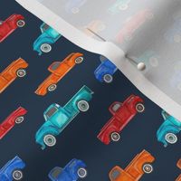 Small Scale Colorful Vintage Trucks  on Navy