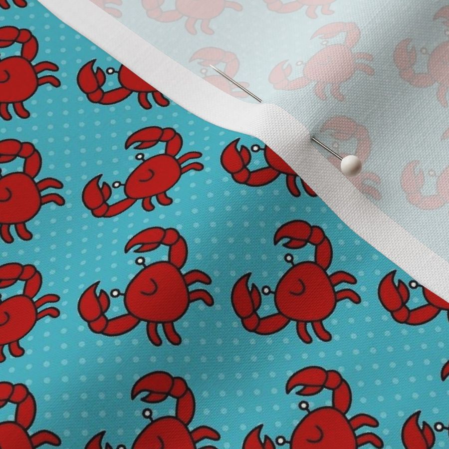 Small Scale Red Crabs on Blue