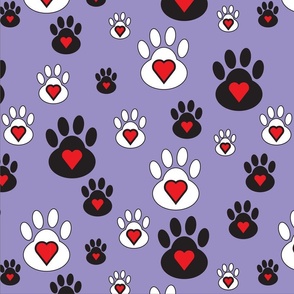 Black and White paws and red hearts on lilac background