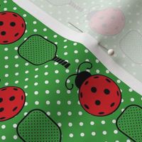 Medium Scale Ladybug Pickleballs and Paddles on Green Polkadots