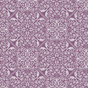 Symmetrical and maximalist vintage floral pattern on white .