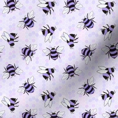 Purple bees on lilac hon