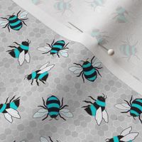Turquoise bees on grey honeycomb 