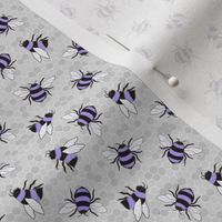 Purple bees on grey honeycomb 