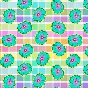 Playful print of multicolored windowpane checks with pop style ditsy flowers - small scale .