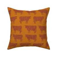 terra + burnt orange cows