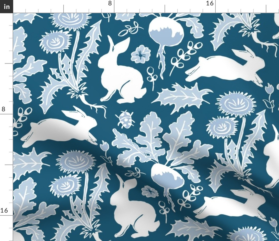 rabbits in the vegetable garden white and blue | medium