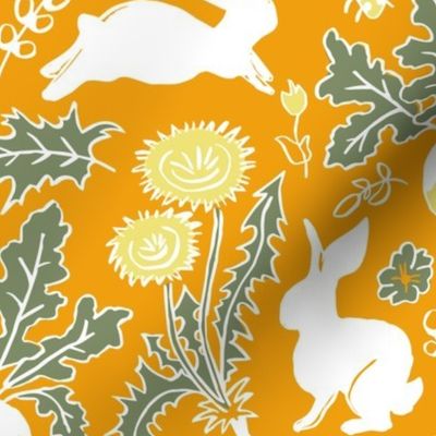 white bunnies in the vegetable garden on marigold | small