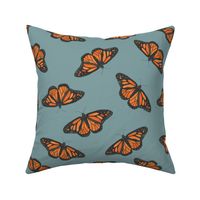 Medium monarch butterflies on a dusty blue base, watercolor butterflies perfect for kids apparel and nursery