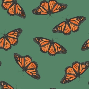 Medium Monarch butterflies on green, hand painted orange butterflies, kids and baby clothin