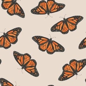 Small monarch butterflies on a dusty blue base, watercolor butterflies perfect for kids apparel and nursery