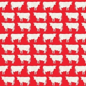 small red + latte cows