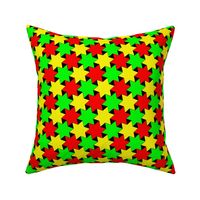 Green Yellow and Red Stars on Black Backgrond