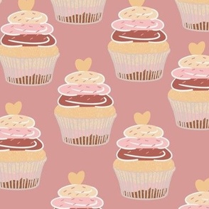 Medium Neapolitan (cream, pink, brown) Cupcakes on Pink background