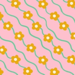 Wavy ditsy floral pattern in pink and mustard yellow - Small scale