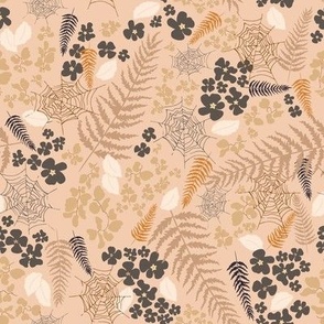 (M) sand and taupe flowers and cobweb, orange and brown fern, white leaves on tan brown