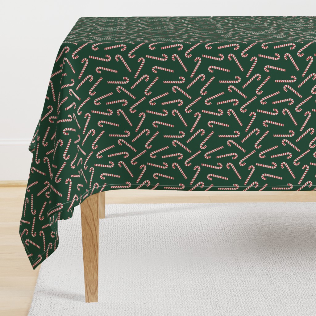 candy canes on dark green