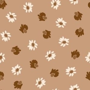 white, copper flowers like polka dots on dark desert sand brown