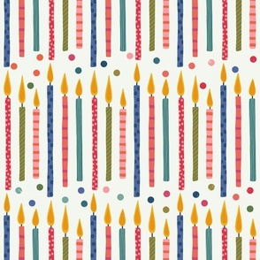Bright Lit Birthday Cake Candles and Confetti