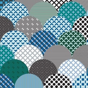 312 - Maximalist patterned jumbo scale clamshells create a faux quilt, in turquoise, teals, greys and blues - for table linen, fresh duvet and bed linen.