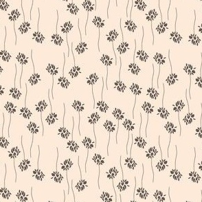 dark brown flowers and twigs in lines on beige