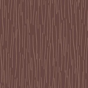 light brown rain stripes on dark burnt umber