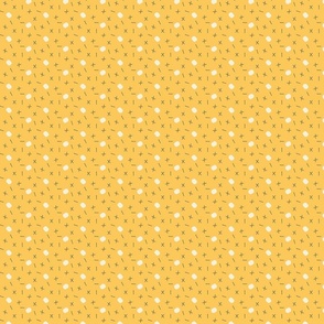 Scattered geometric beige and navy lines, and shapes on yellow 