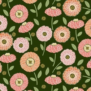 Pink tones Zinnia flowers scattered on dark green 