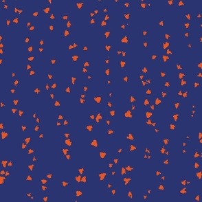 painted  orange dots on blue background