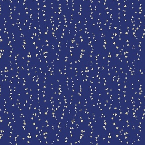 small painted beige dots on blue background