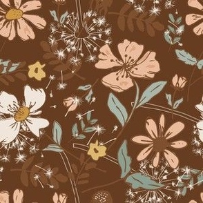 cream and pink flowers on brown