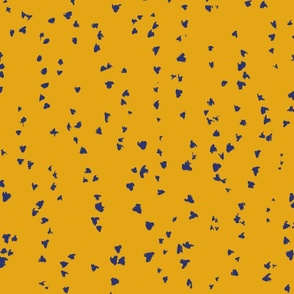 small painted blue dots on yellow background