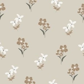 Small forest flowers in beige and white on light linen