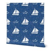 Blue White Sailing Boats and Anchors in the Ocean 