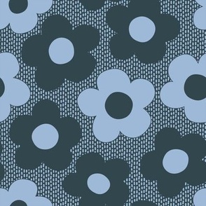 Medium scale / Graphic Daisy Hippy Flowers / In Pantone blues, navy and blue on a navy ground that has a dashed line in a lighter blue as a texture.
